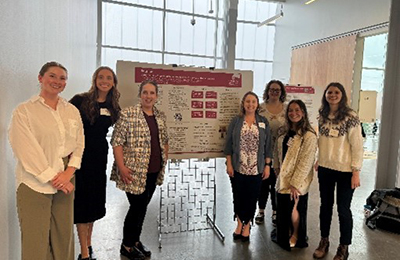  LEND trainees presentling their posters